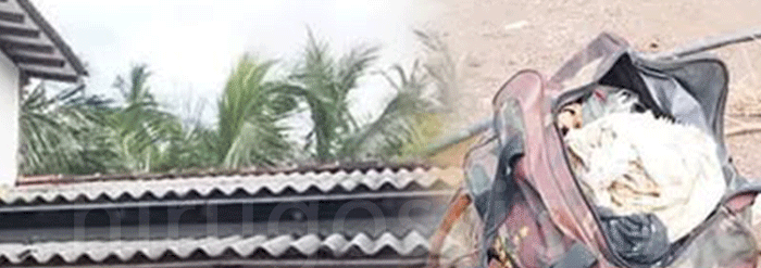 හෙළිකොප්ටරයෙන් බේරාගනිද්දී රන්බඩු, මුදල් සහිත බෑගය වතුරට වැටිලා.. – ගෙවත්තක කම්බියේ පැටලී තිබූ බෑගය අයිතිකරුට භාරදෙයි..